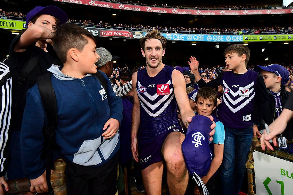AFL 2016 Rd 13 - Fremantle v Port Adelaide PERTH, AUSTRALIA - JUNE 18: Michael Barlow of the Dockers celebrates the win with the fans during the 2016 AFL Round 13 match between the Fremantle Dockers and Port Adelaide Power at Domain Stadium on June 18, 2016 in Perth, Australia. (Photo by Daniel Carson/AFL Media)
